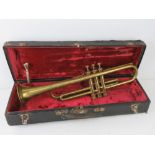 A vintage brass trumpet within original fitted case, slightly a/f, having mouthpiece.