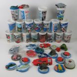 A quantity of assorted Thunderbird themed drinking cups with novelty lids, mostly as made for