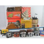 A quantity of assorted 1960s and 1970s camera and cine equipment including; Kodak Brownie 8 movie