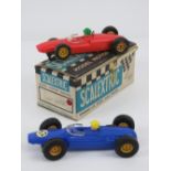 A Triang Scalextric Lotus MM (C67) in red with original box. Together with A Triang Scalextric