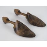 A pair of vintage wooden shoe lasts, size 7 1/2.
