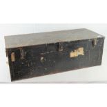 A metal travel trunk with clasp and end handles with original 'Cabin' label upon, 93 x 39 x 31cm.