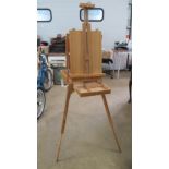 A well made artists box with integral easel.