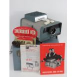 A Lumaplak Maxilite 300 Cool-lite 400 slide projector in 'as new' condition in case, with
