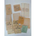 A quantity of assorted vintage unused shop paper bags, together with a quantity of post-war