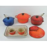 Le Cruset Cookware; casserole dish (20), two lidded saucepans, oven dish and two ramekins. Also