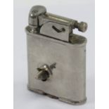 A WWII UL lighter with bullet stuck in it, made in England.