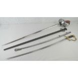 Two reproduction swords; British Cavalry and German with Lions head design, each with scabbard.