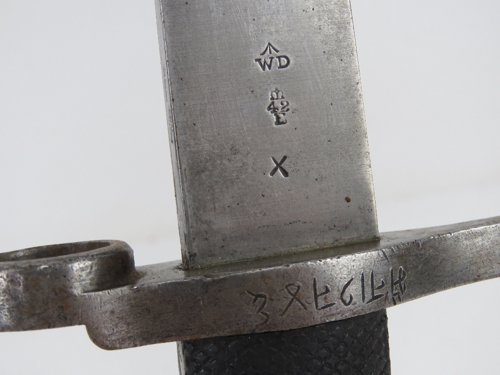 A Martini Henry sword bayonet with scabbard, dated 1894 with WD markings and numbered 10405. - Image 3 of 6