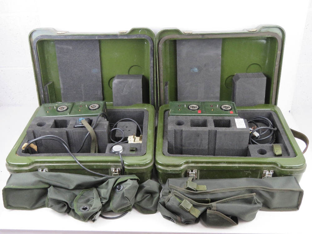 Two British Military PD4-M detector kits in transit cases with accessories.