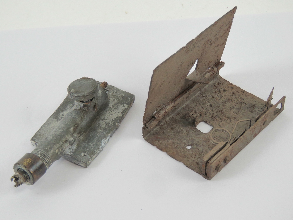 A rare WWII British SOE No.2 switch booby trap, together with a WWII British SOE No.3 switch.