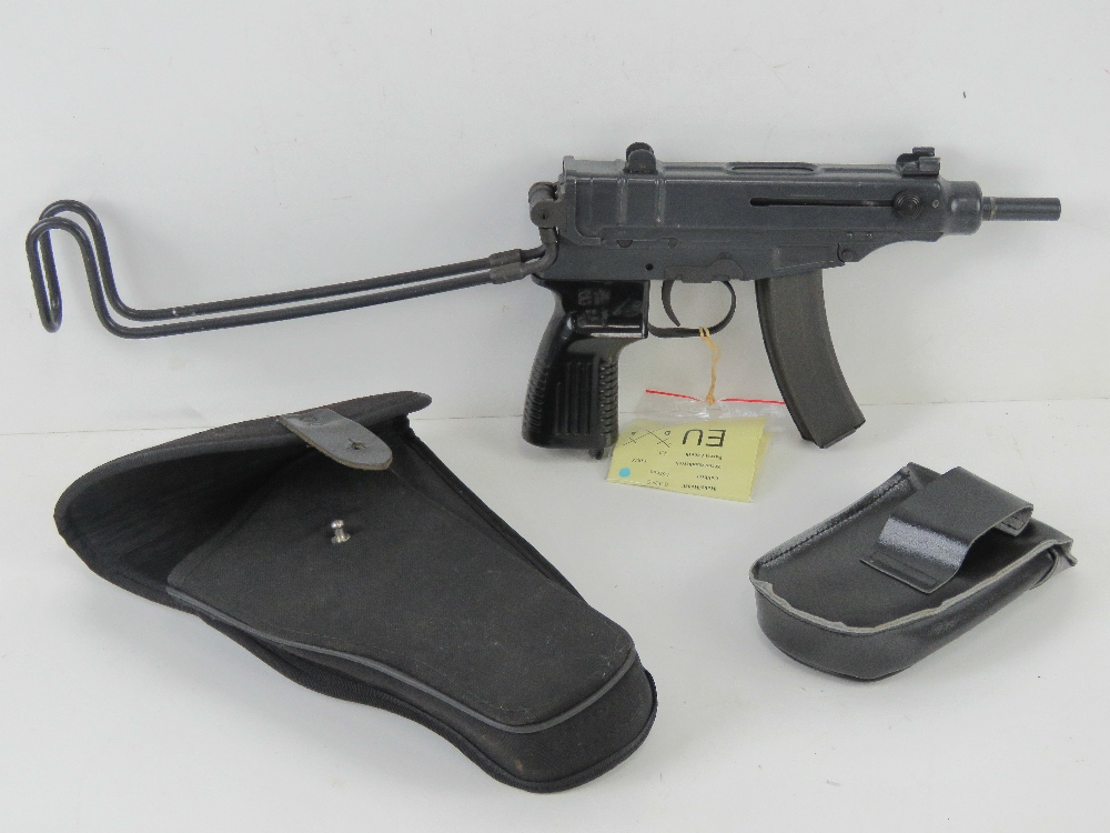 A deactivated Czech Skorpion Wz61 7.65mm Sub Machine Gun with black polymer grip.