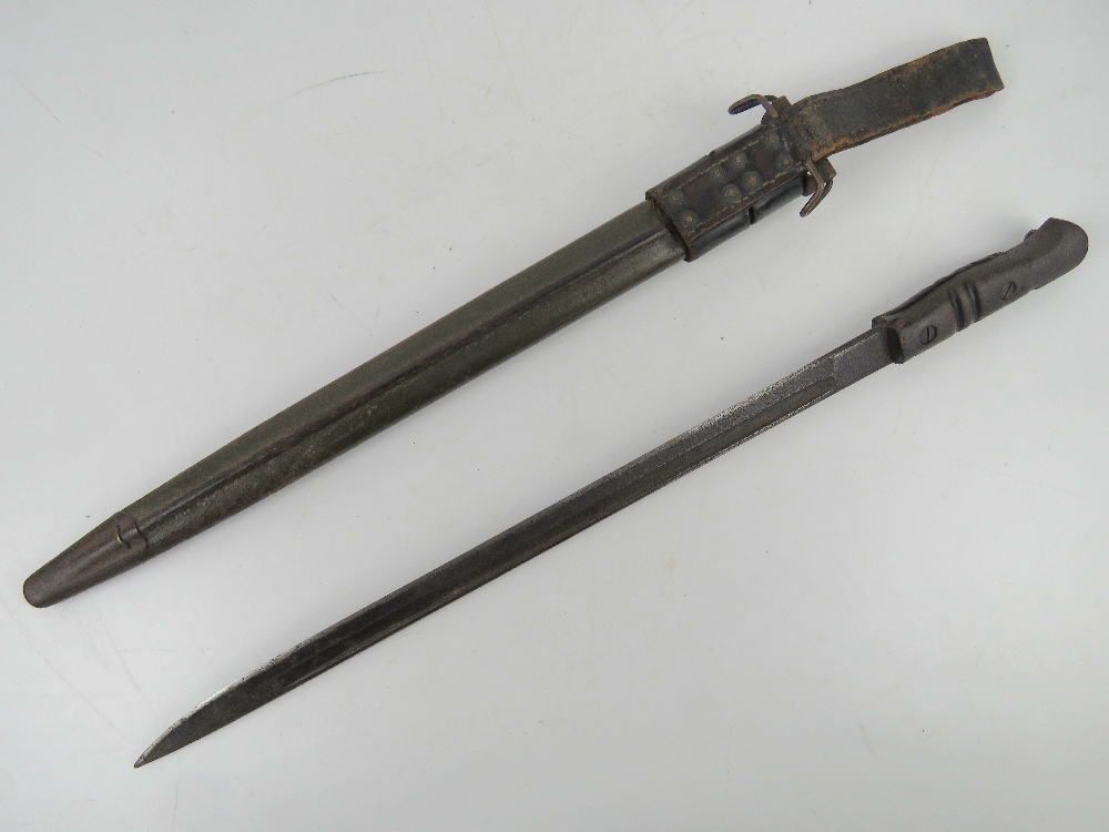 A P14/17 bayonet 44cm blade and wooden grip, with scabbard and frog. - Image 4 of 4