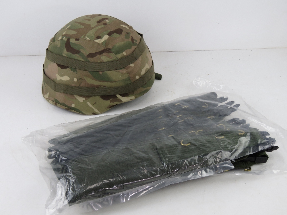 A British Military MK7 helmet with MTP helmet cover, size small.