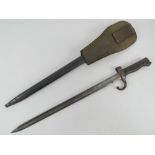 A WWI French 1892 pattern Mannlicher-Berthier bayonet with scabbard and frog.
