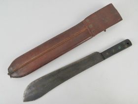 A WWII British machete with scabbard, marked J.J.