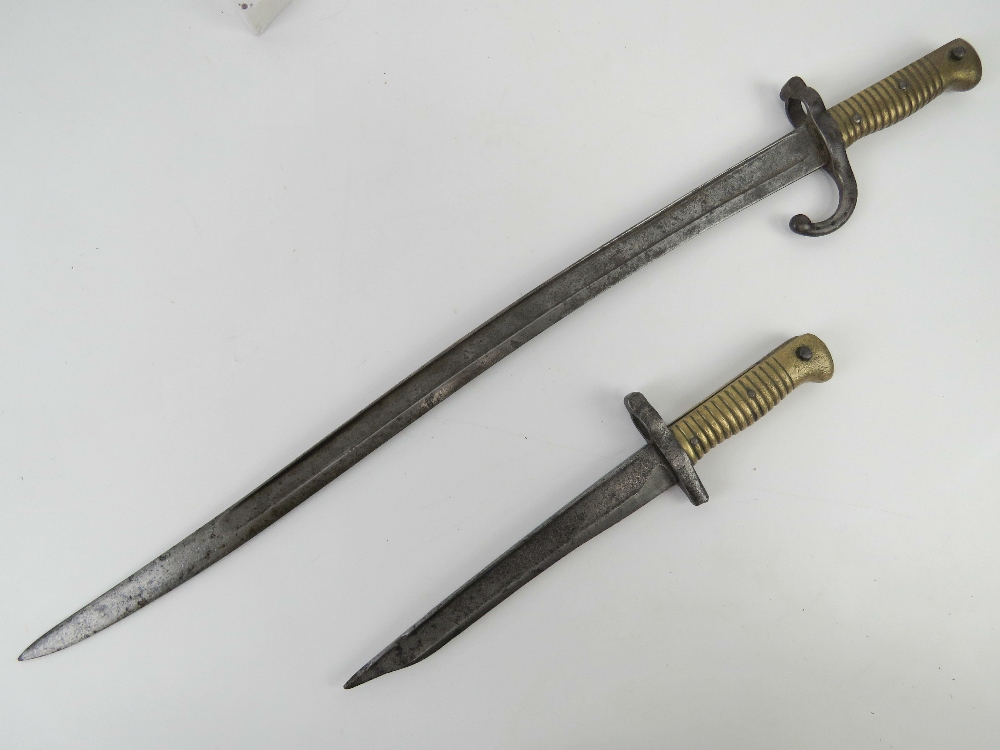 A French Chassepot 1866 pattern bayonet, together with a converted 1866 fighting knife. Two items.
