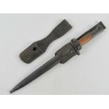 A WWII Czech Mauser bayonet dated 1944 with matching scabbard, and leather frog.