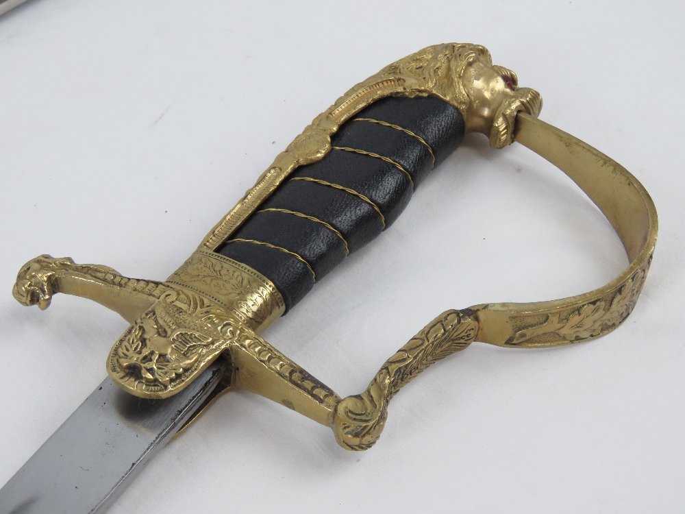 Two reproduction swords; British Cavalry and German with Lions head design, each with scabbard. - Image 4 of 4