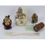 A carved soapstone monkey, a small wooden netsuke inset with stag antler and opposing compass,