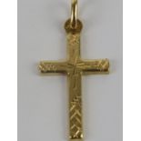 An 18ct gold crucifix, hallmarked 750, 3cm including bale, 1.1g.