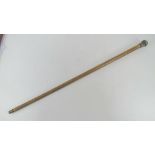 A swagger stick having white metal knop, top slightly a/f, no apparent hallmarks, 83.5cm in length.