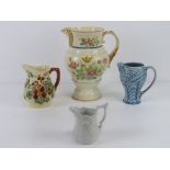 Four assorted decorative jugs inc Portmeirion Parian, Wade,