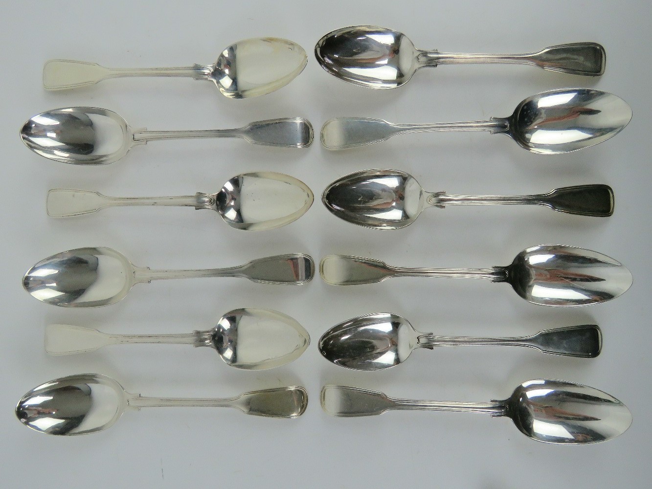 A set of twelve Victorian HM silver serving spoons,