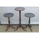 A matched pair of Edwardian wine tables each having turned stem of triform base, 33cm dia,