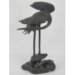 A 20th century bronzed cast brass Oriental stork upon naturalistic base with single terrapin, a/f,