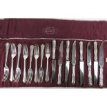 A set of HM silver salad knives and forks for twelve settings by William Hutton & Sons Ltd,
