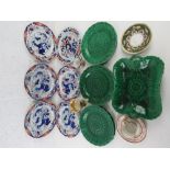 A set of five Spode New Stone Oriental influence plate together with a quantity of green Wedgwood