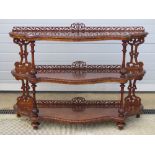 A fine 19thC walnut three tier open fronted buffet or credenza having shaped shelves in fine