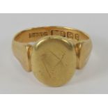 Freemasonry; An 18ct gold signet ring having square and compasses symbol upon,