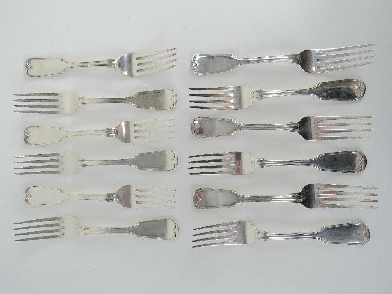 A set of twelve Victorian HM silver forks,