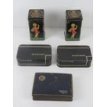 Two vintage tins having children gardening upon together with two vintage Black Magic chocolate