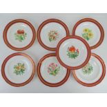 A rare set of 19thC Minton botanical cabinet plates having gilded and dark pink border each having