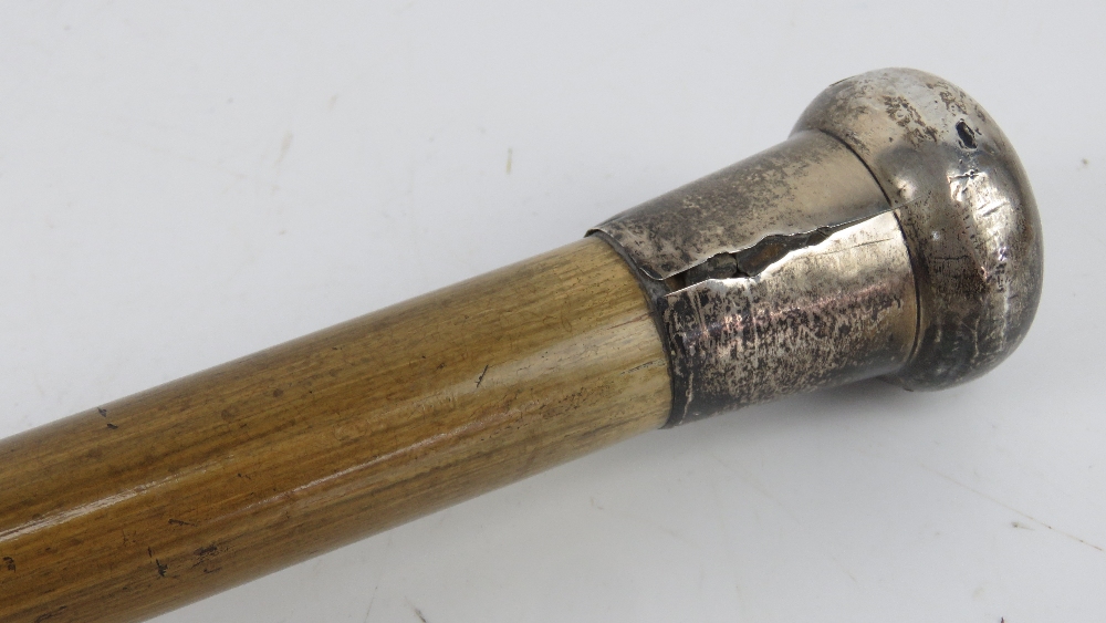 A swagger stick having white metal knop, top slightly a/f, no apparent hallmarks, 83.5cm in length. - Image 2 of 3