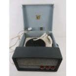 A vintage record player 'His Master's Voice' Garrard model 209 with replacement stylus.