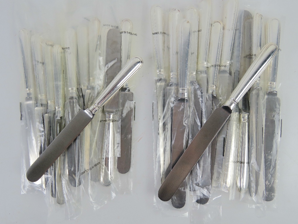 A set of twelve HM silver handled dinner knives,