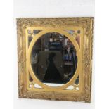 A late 18th/early 19thC gilt wood and plaster square shaped wall mirror,