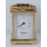 A fine heavy brass five glass carriage clock, enamel dial with eleven jewel movement,