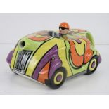 A Lorna Bailey teapot in the form of a racing car, 'Groovy 1' floral pattern,