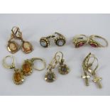 Six pairs of vintage rolled gold earrings including cameos, citrine coloured stone, crucifix, etc.