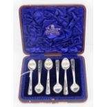 A set of six white metal niello teaspoons, no apparent hallmarks, in associated case, 85.2g / 2.
