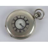 A HM silver top wind full Hunter pocket watch having viewing pane with blue enamel chapter ring to