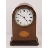 An Edwardian mantle clock having inlaid boxwood,