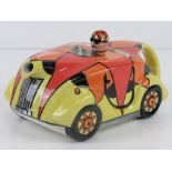 A Lorna Bailey teapot in the form of a racing car, 'DECO 1' pattern,