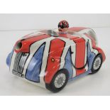 A Lorna Bailey teapot in the form of a racing car, '605 SWING 3R' pattern,