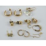 A quantity of 9ct and yellow metal earrings, mostly pairs, total weight 7.5g.